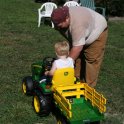 Dad demonstrates the tractor radio